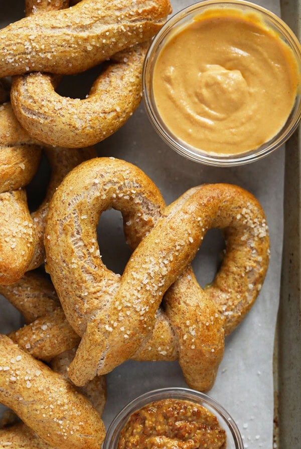A recipe for soft pretzels with peanut butter baked on a sheet.