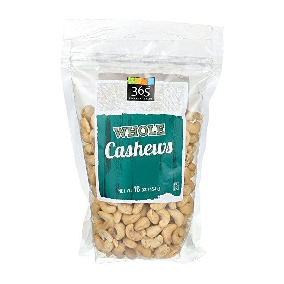 A bag of cashews, perfect for making vegan mac and cheese, displayed on a white background.