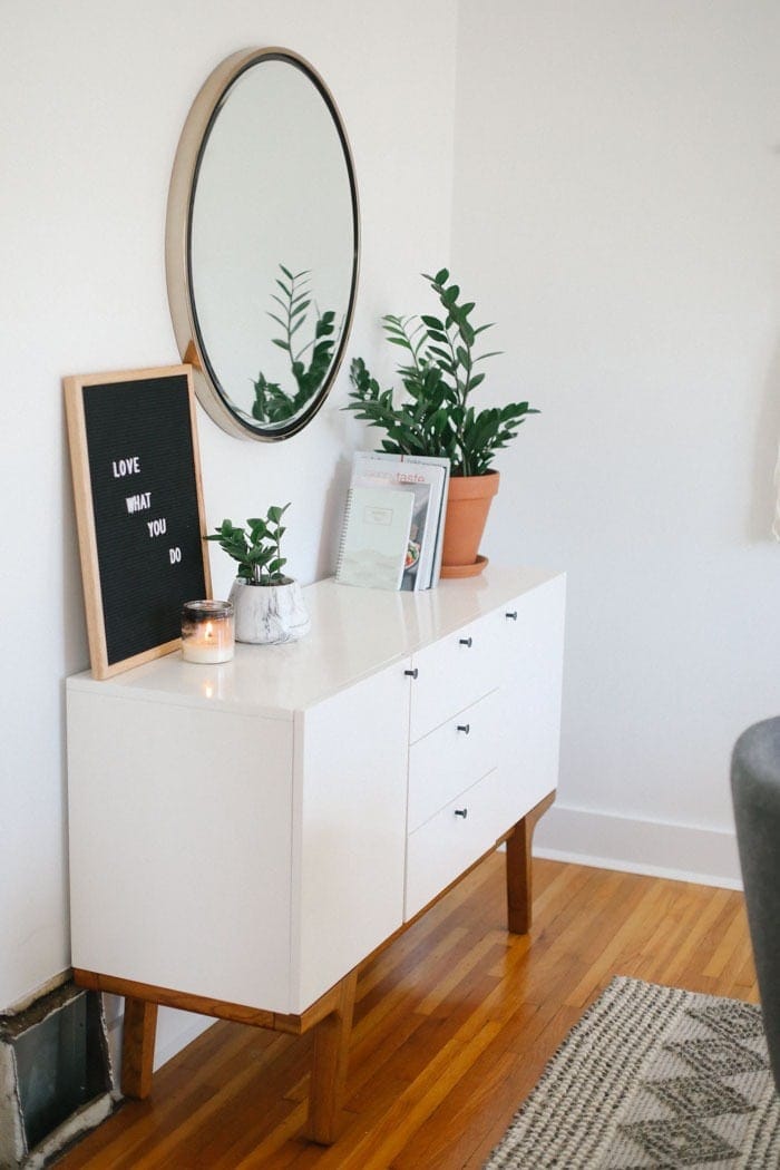 Modern buffet with circle mirror