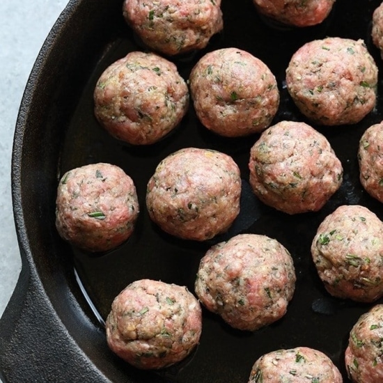 Easy recipe for meatballs cooked in a cast iron skillet.