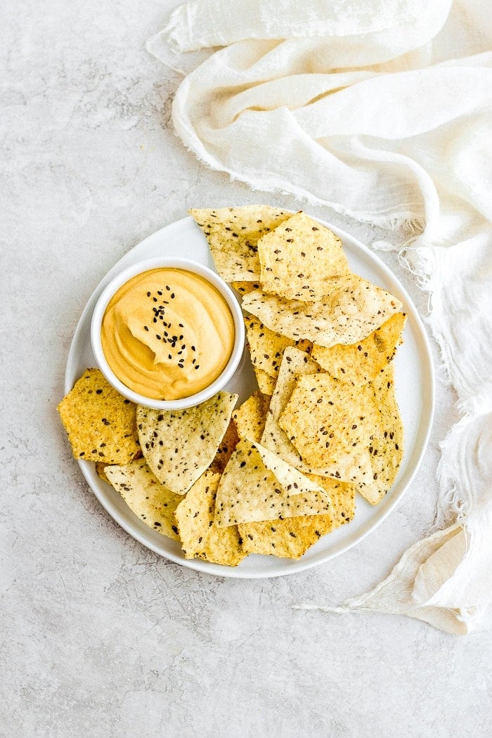 Vegan Cheese Sauce on plate with chips.