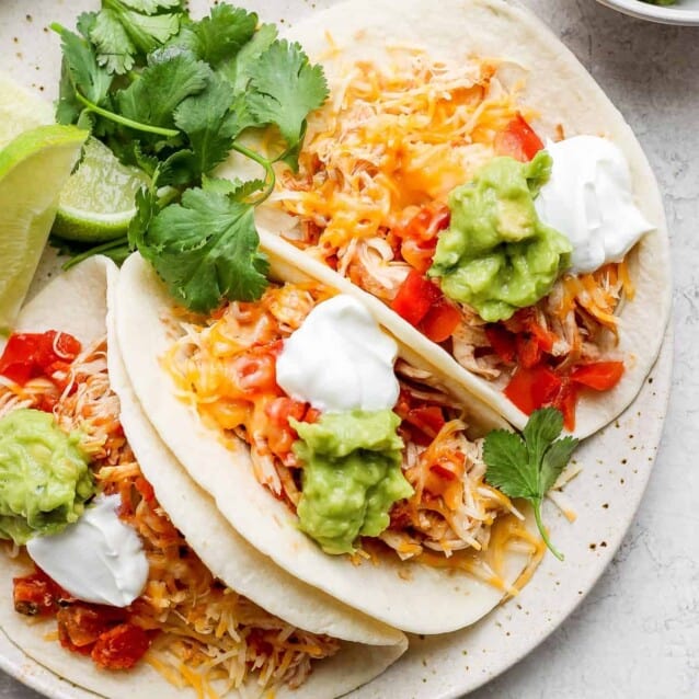 Easy Crockpot Chicken Tacos (4 ingredients!) - Fit Foodie Finds