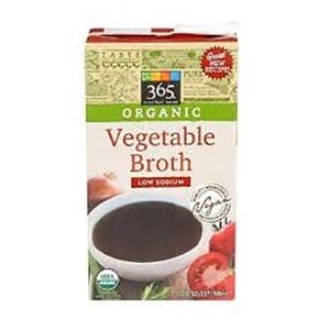 16 oz. of 365 organic vegetable broth, perfect for vegan cheese sauce.
