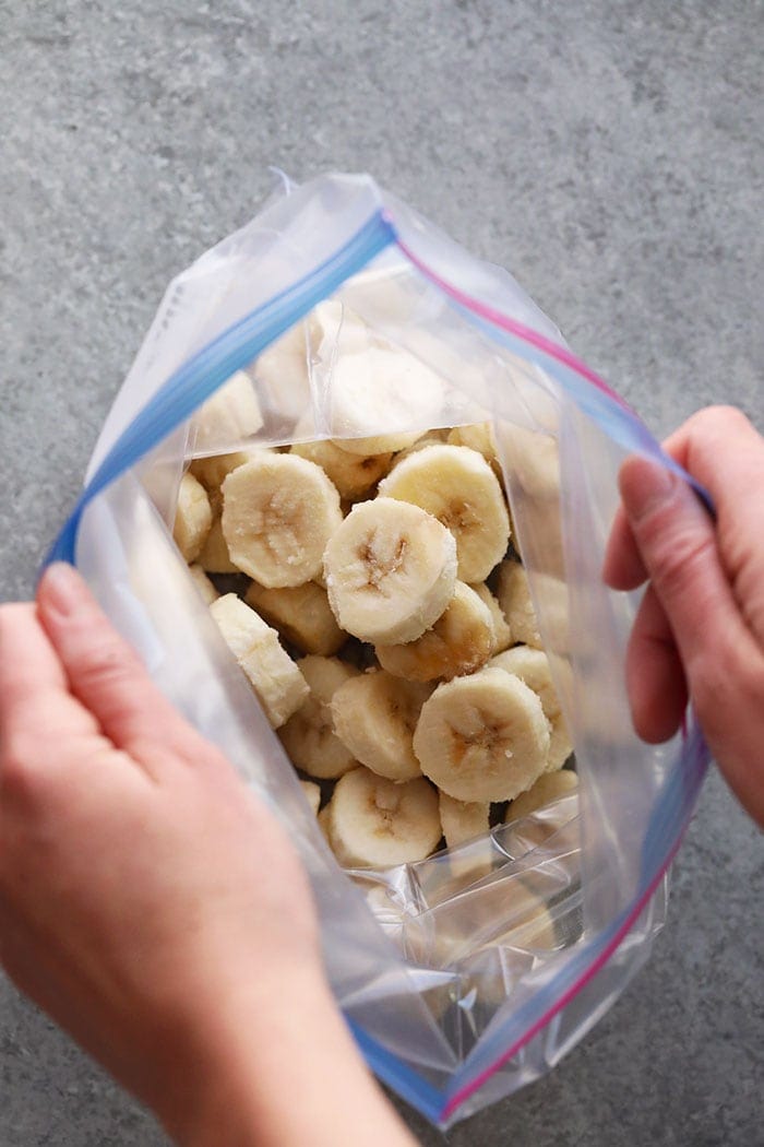 Frozen sliced bananas in a freezer safe bag
