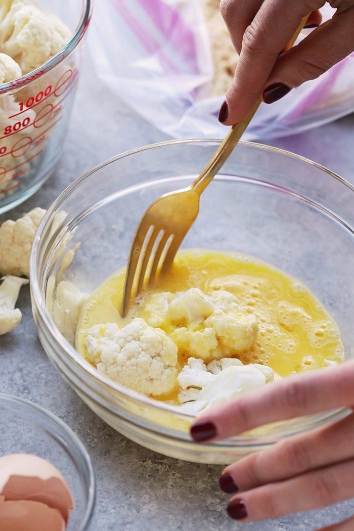 Cauliflower wings in an egg wash