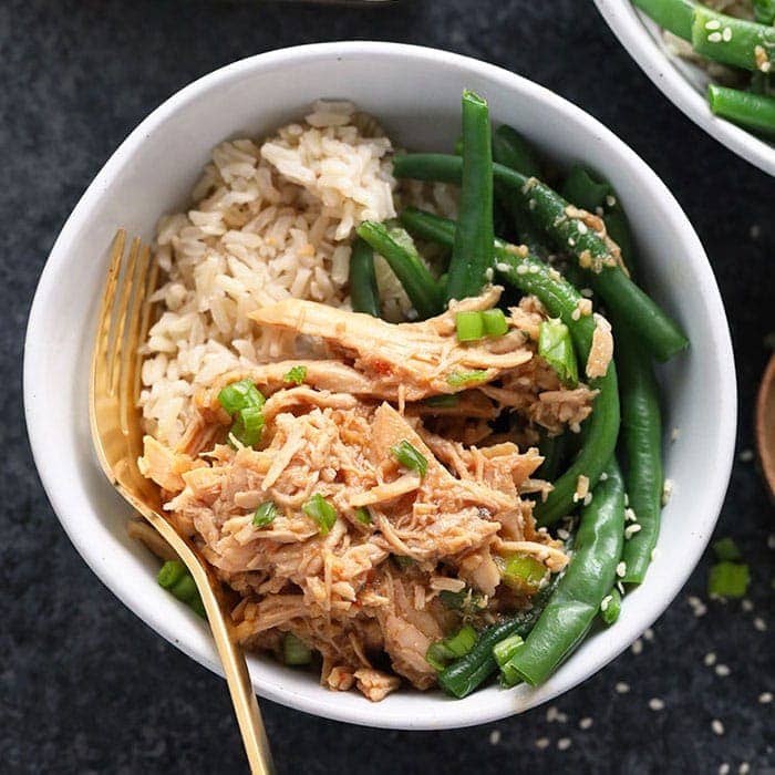 Honey garlic chicken sprinkled with green onions.