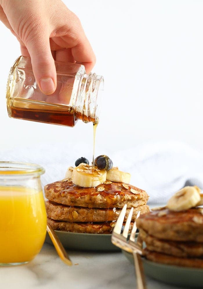 banana oatmeal pancakes with maple syrup