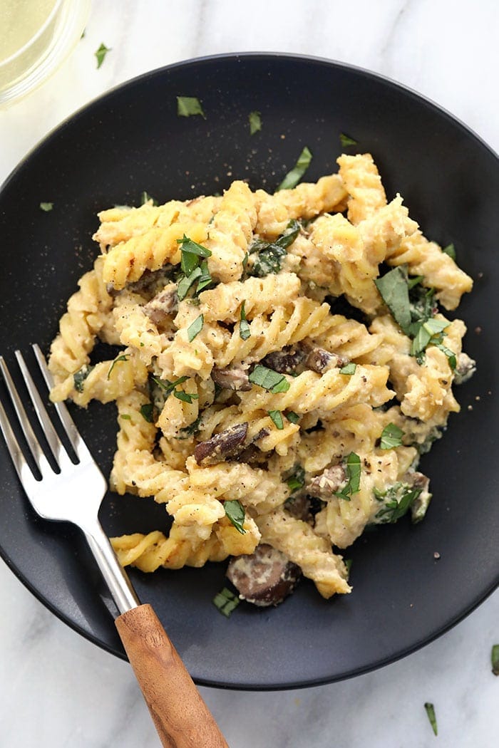 vegan pasta bake with white wine cheese sauce in a bowl