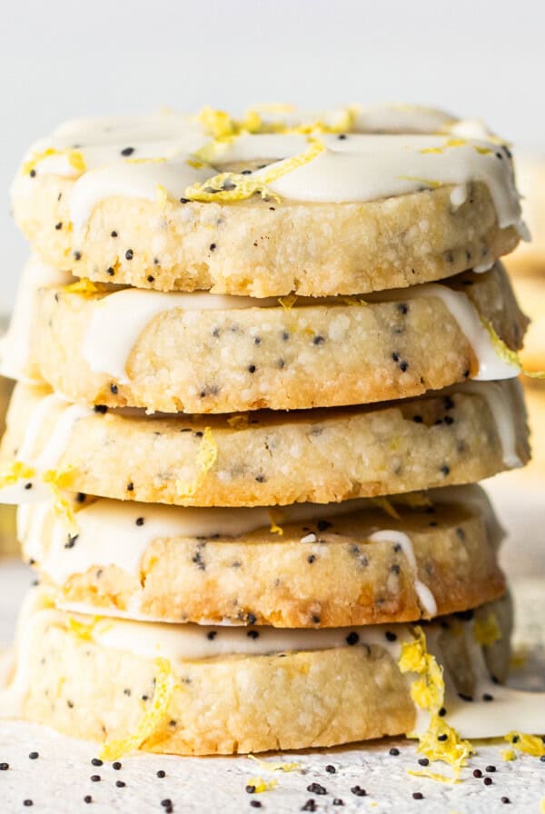 Lemon poppy seed cookies with icing and sprinkles.