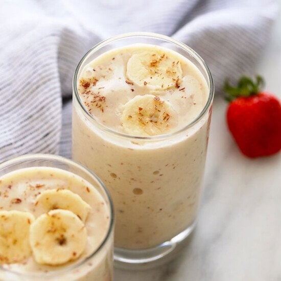 a banana smoothie in a glass