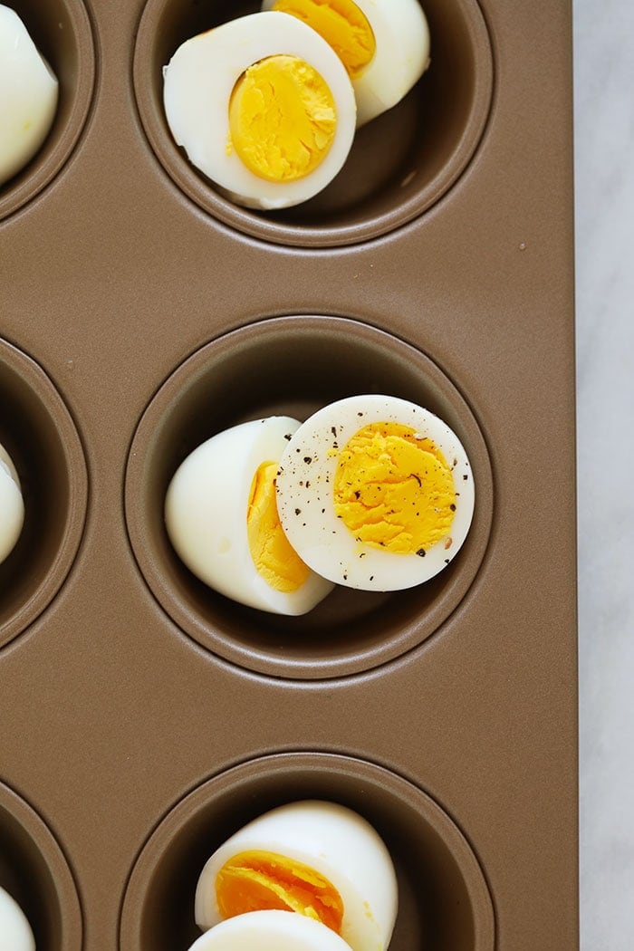 hard boiled eggs in a muffin tin
