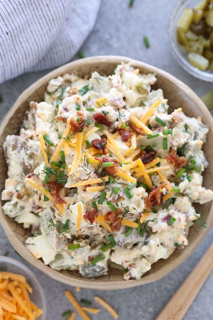 A bowl of loaded baked potato salad