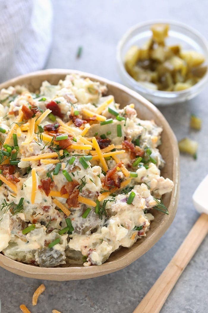 loaded baked potato salad in a bowl