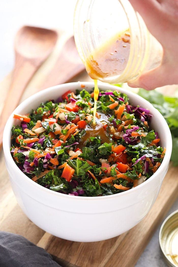 This Asian Salad Dressing is made with garlic, apple cider vinegar, maple syrup, and a little soy sauce. It's the perfect healthy salad dressing to top on your favorite kale salad or use as a chicken marinade! Asian Salad Dressing