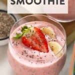Strawberry chia smoothie with bananas containing chia seeds.