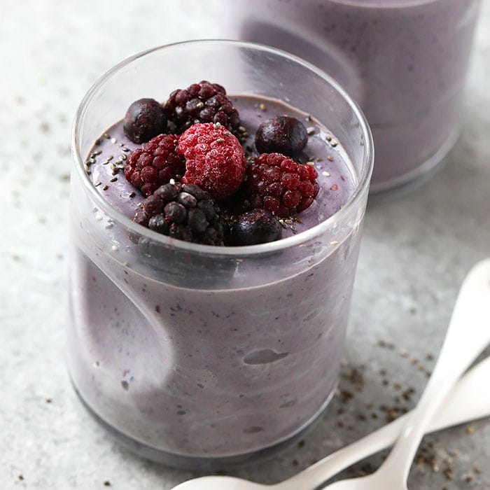 triple berry protein smoothie in a glass