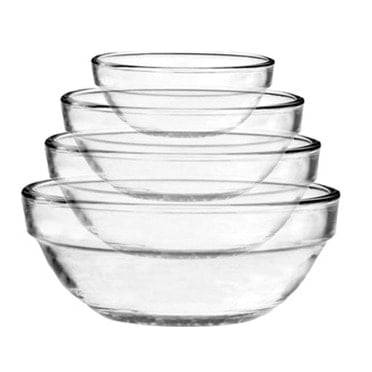 A visually appealing arrangement of four clear glass bowls, invitingly stacked with a delectable Strawberry Spinach Salad.