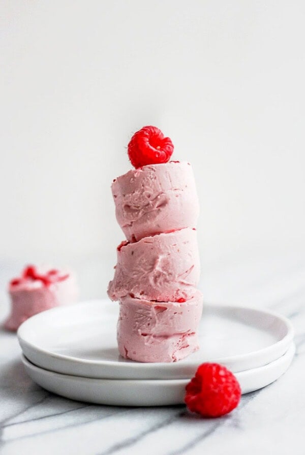 Fat bombs stacked with raspberry on top