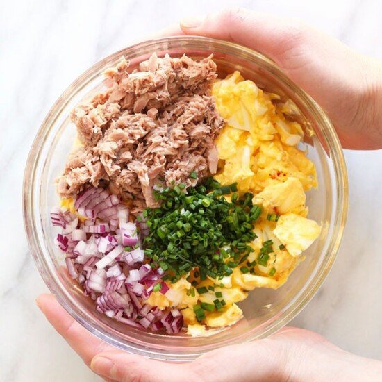 tuna egg salad ingredients in a bowl