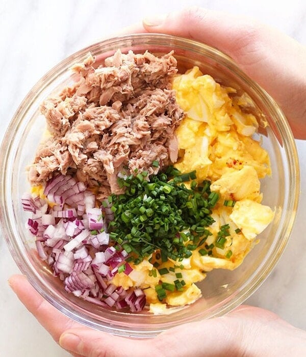 tuna egg salad ingredients in a bowl