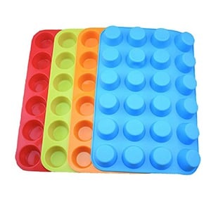 A set of four different colored silicone muffin tins perfect for making fat bombs.