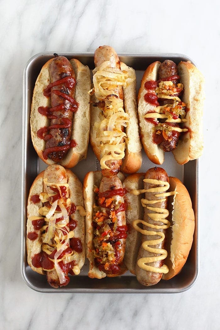 beer brats on baking sheet