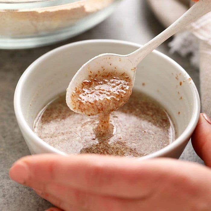 Mixing a flax egg in a bowl.