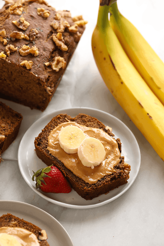 Vegan banana bread with nut butter on top