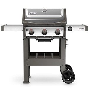 a gas grill with three burners on a white background.
