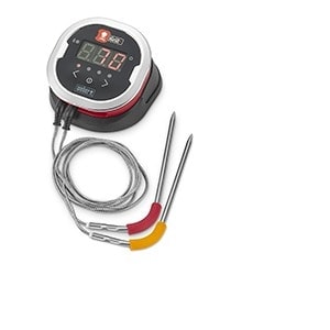 a digital thermometer with a pair of tongs.