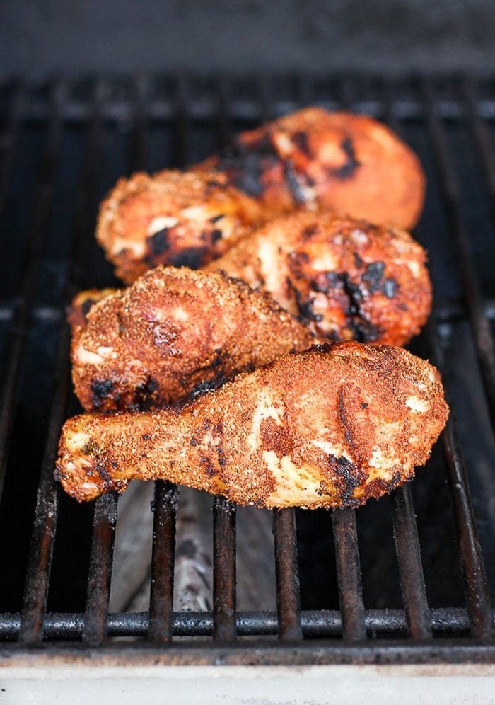 chicken legs on grill.