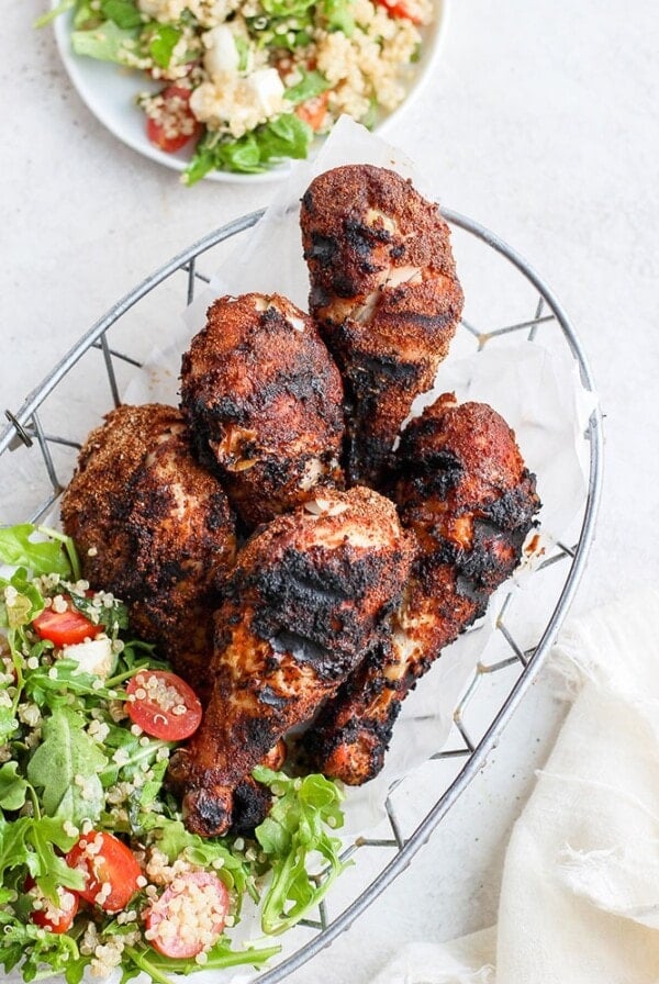 grilled chicken legs in basket