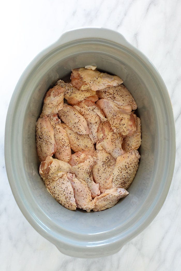 uncooked chicken wings in crockpot