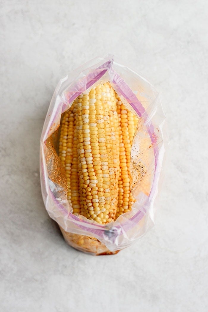 corn on the cob in plastic bag.