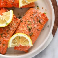 raw salmon on plate.