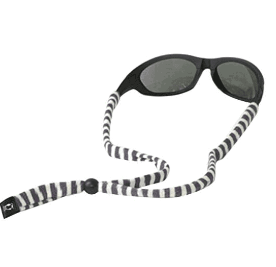 a pair of sunglasses with a black and white striped strap.