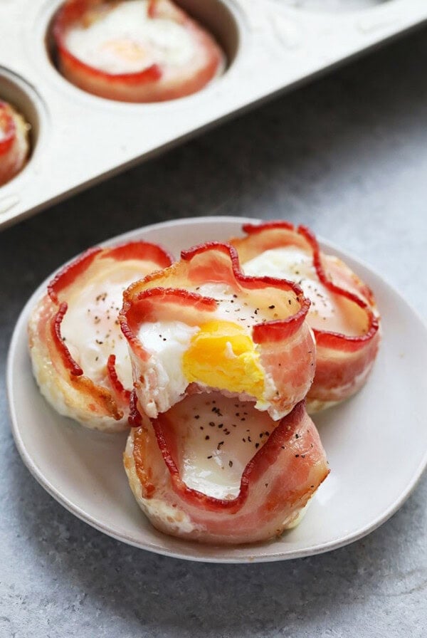 Create bacon wrapped egg cups using a muffin tin.