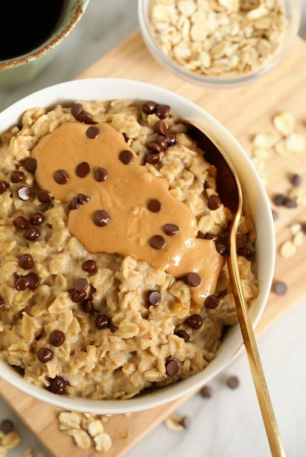 Microwave oatmeal topped with peanut butter and chocolate chips.
