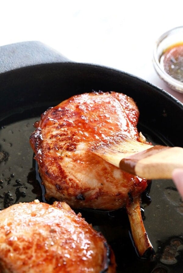 Baked bone-in pork chops smothered in barbecue sauce.