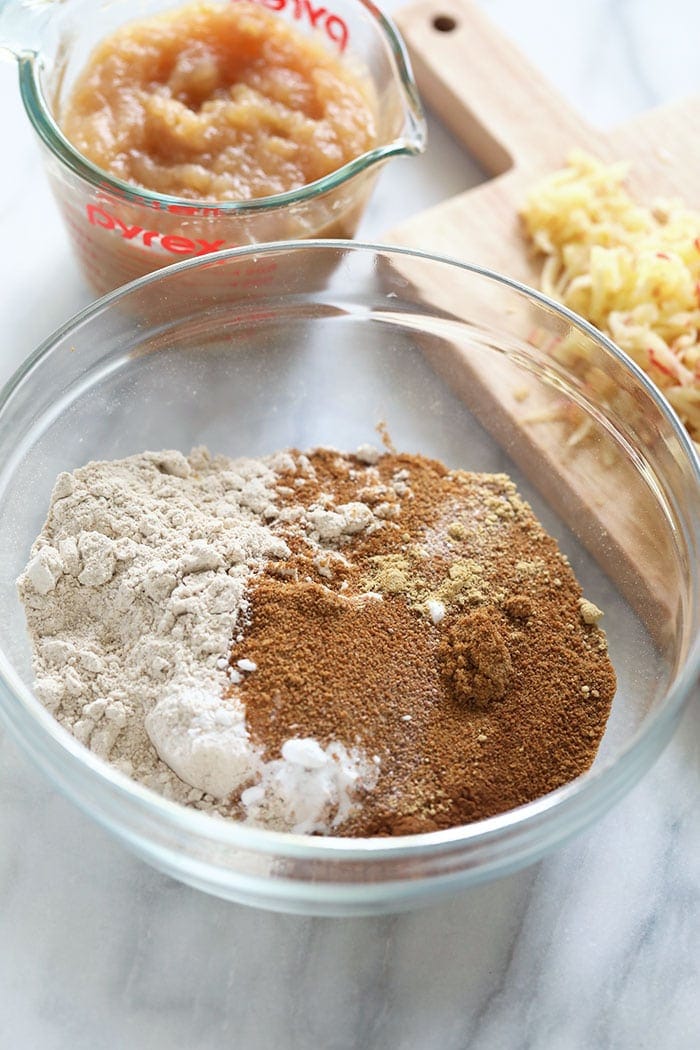 Cinnamon apple bread ingredients in a bowl.