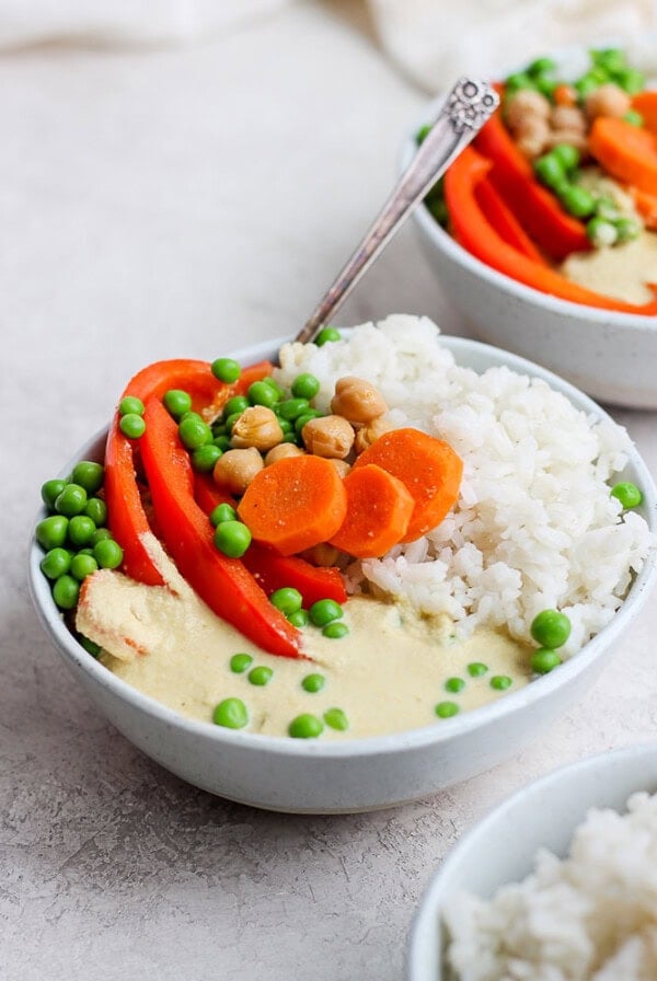 creamy cashew curry in a bowl with rice