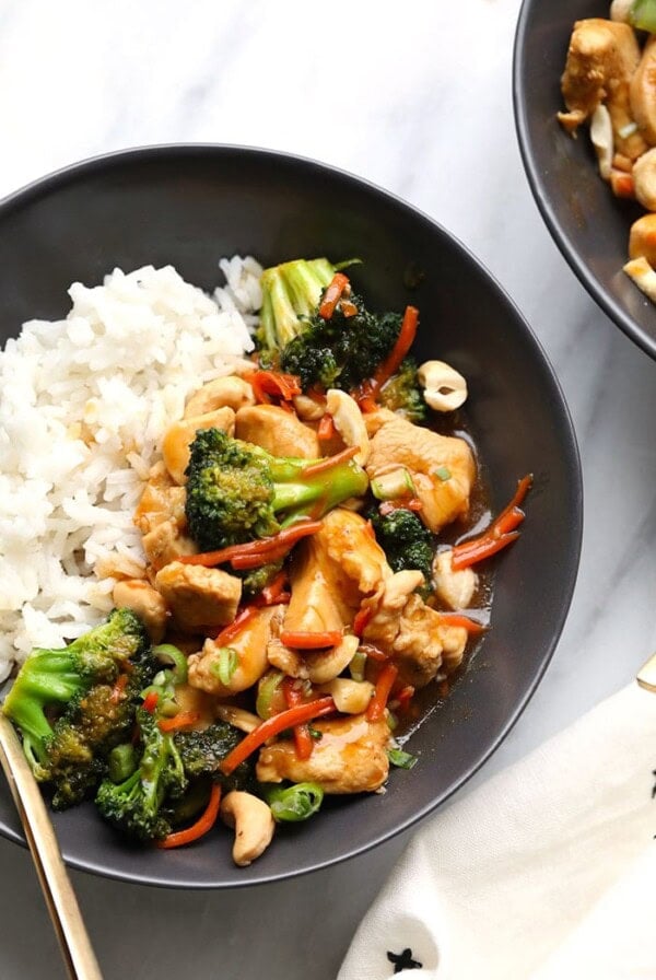 chicken stir fry in bowl with white rice