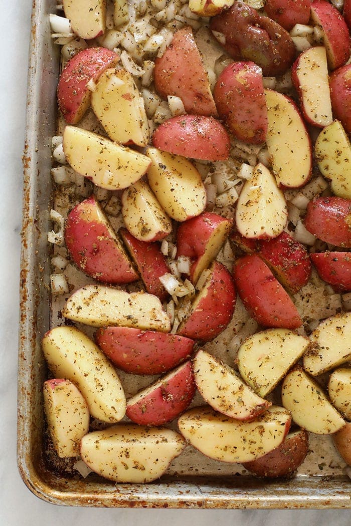 Red potatoes on a baking sheet