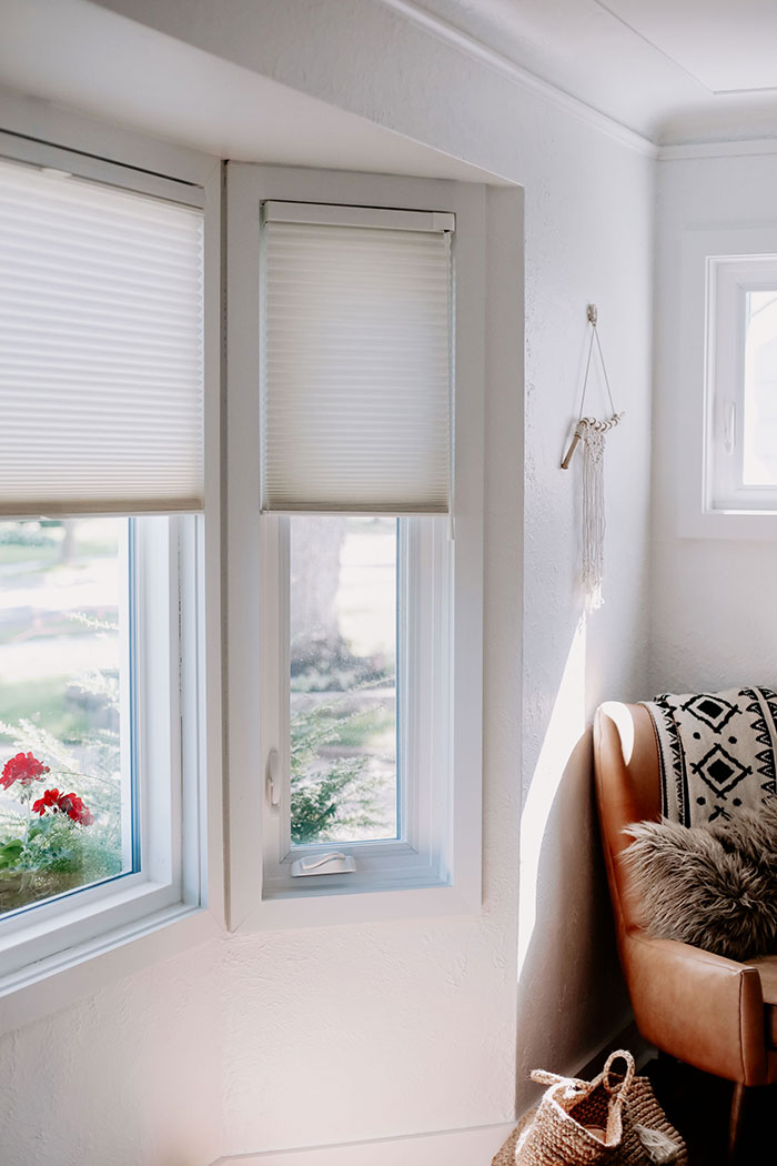 white custom hunter douglas blinds in window