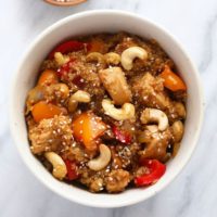 A Cashew Chicken Casserole with vegetables and cashews.