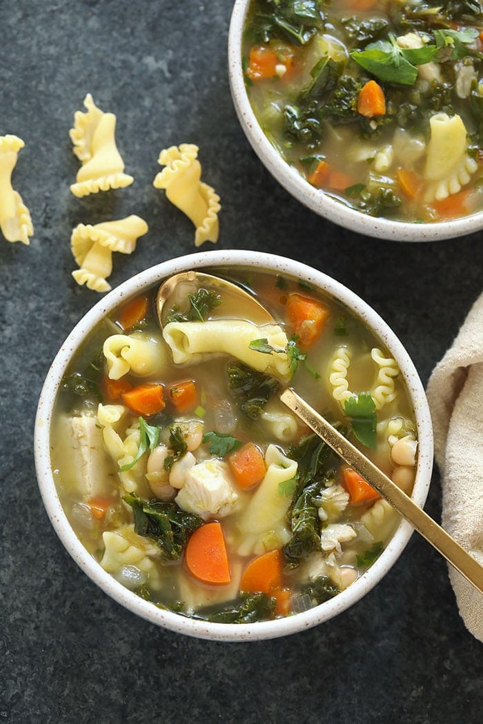 Spicy chicken noodle soup in a bowl 