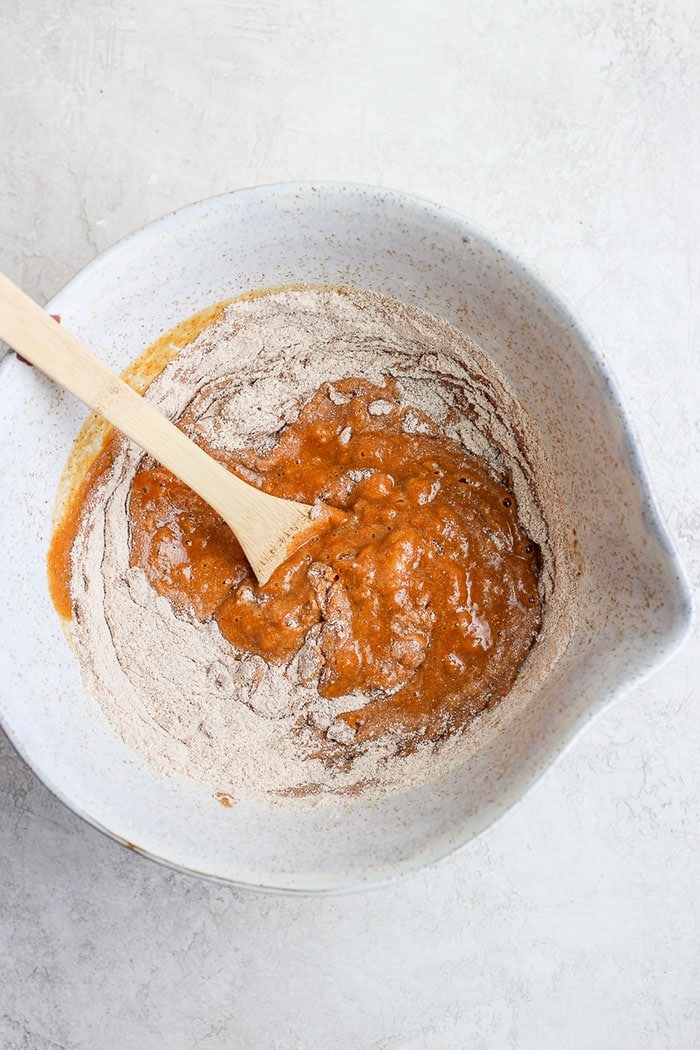 healthy pumpkin bread ingredients in a bowl.