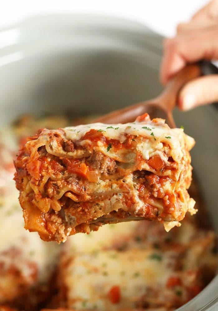 Crock pot lasagna on a spoon.