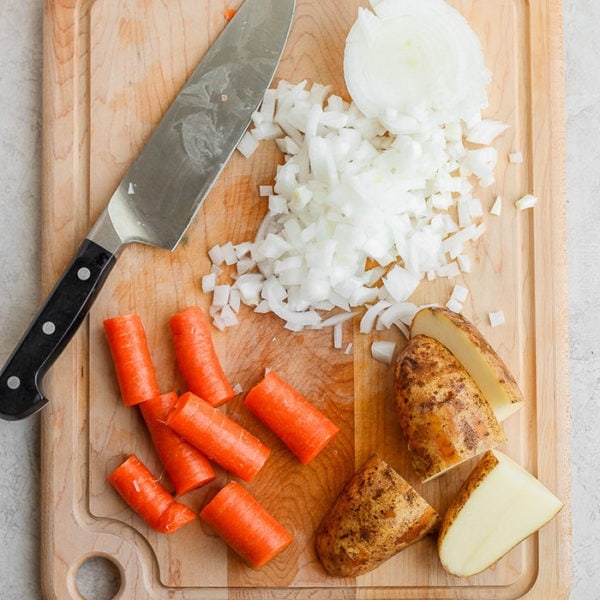 veggies on cutting board.