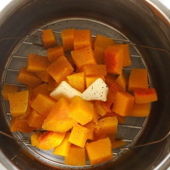 Instant Pot Butternut Squash pieces served in a stainless steel bowl.